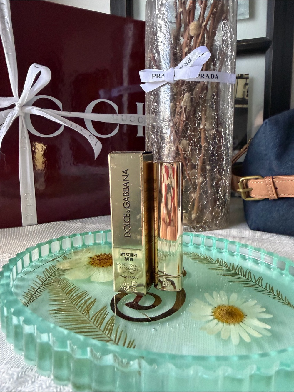 Dolce & Gabbana Satin Lipstick in (My 1981) comes in a Shiny Gold Case